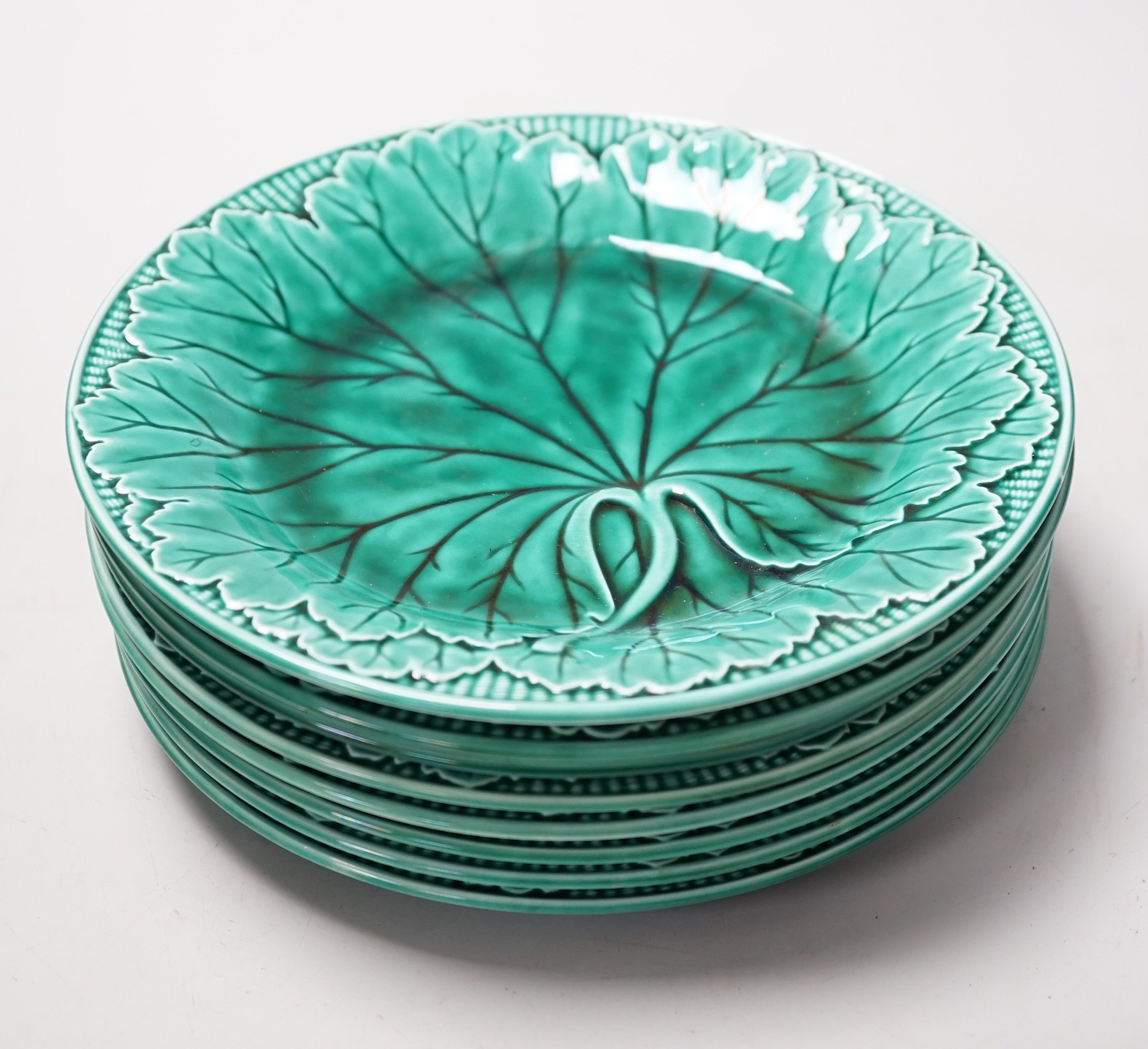 A set of eight Wedgwood cabbage leaf plates, 20cm